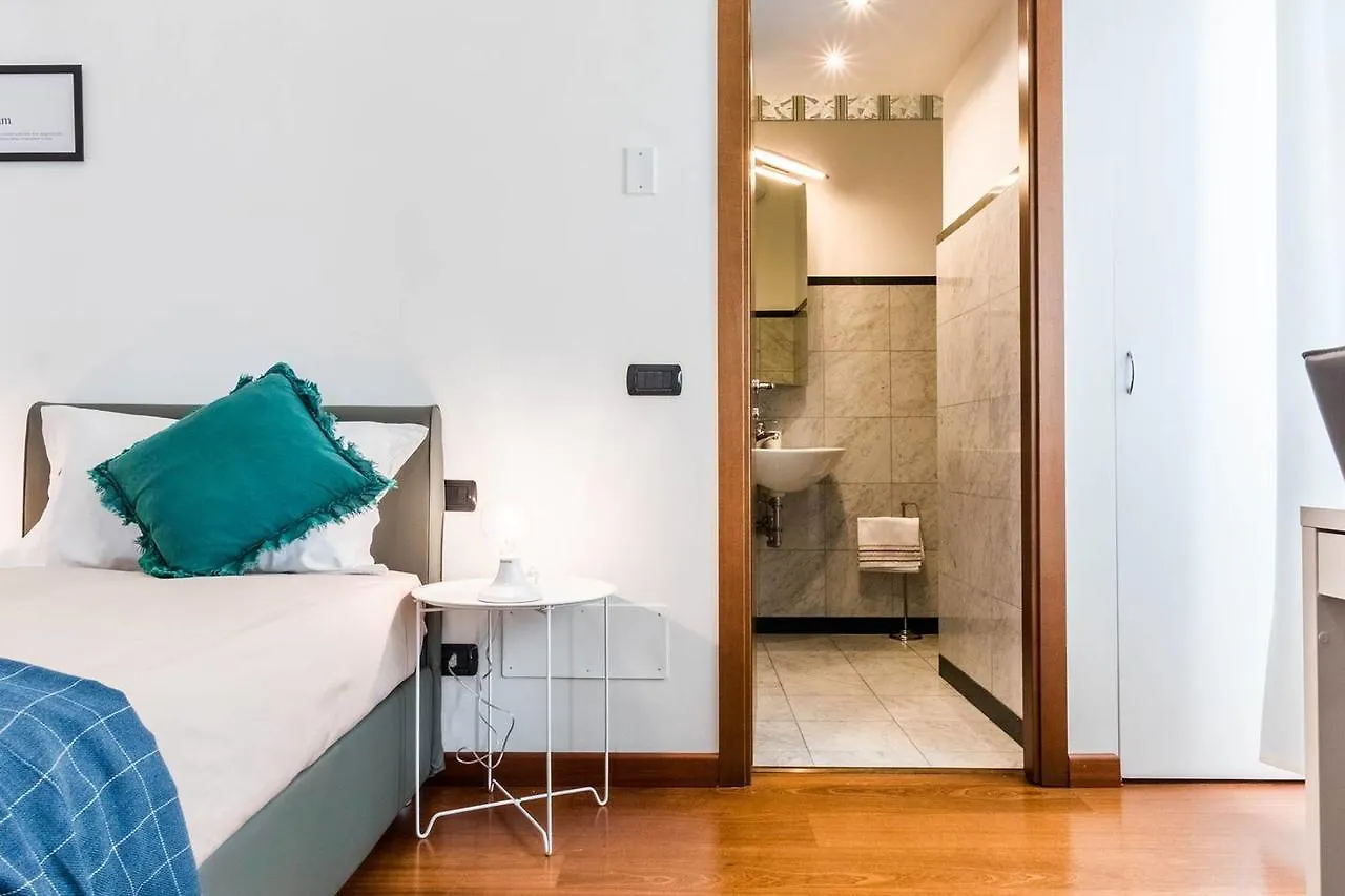 Апартаменты Hintown Duomo Via Baracchini Милан